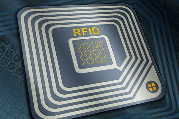 Close-up illustration of an RFID tag with a coiled antenna and central microchip.